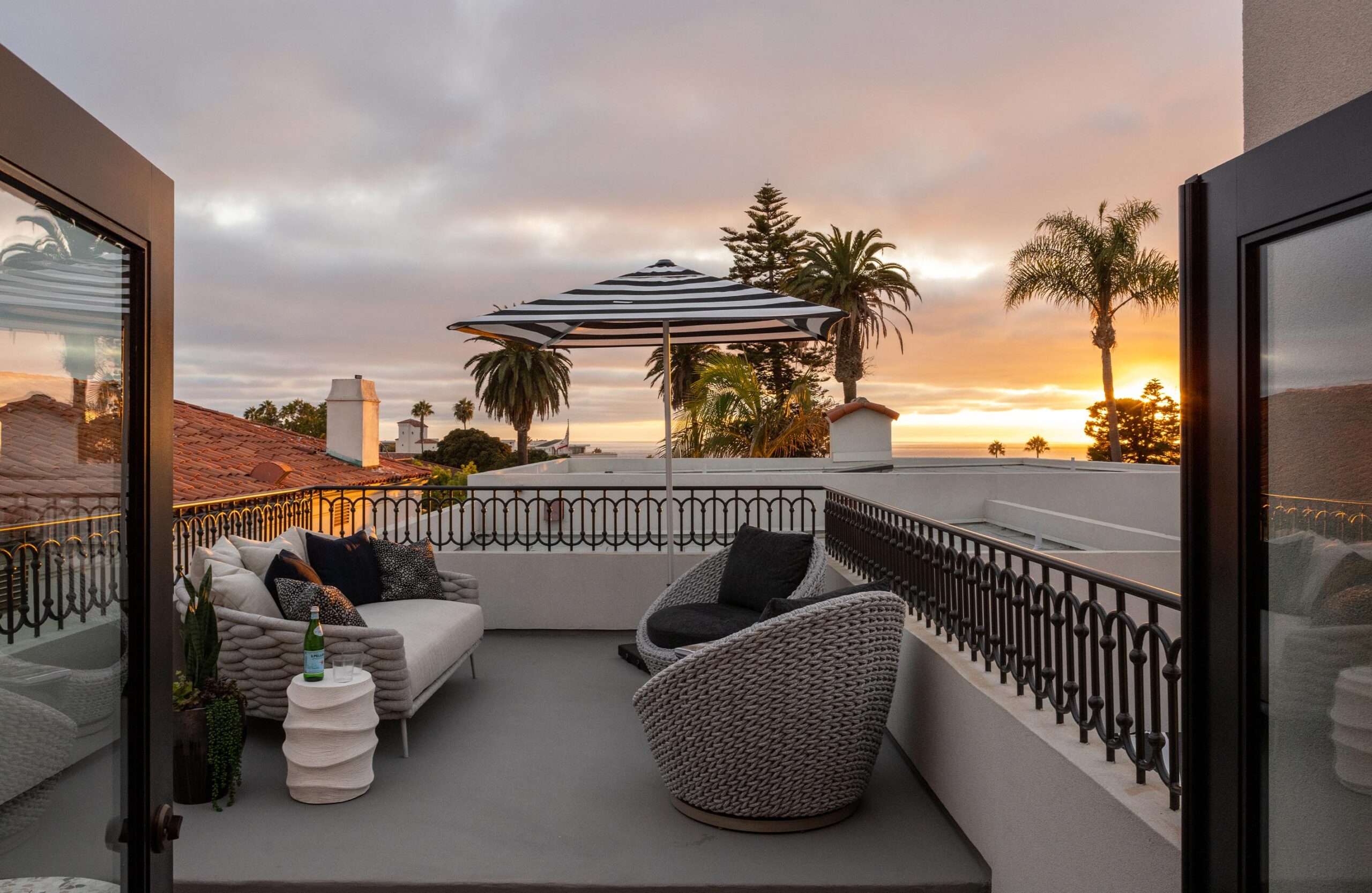 Sunset view from the deck of The Irving Gill Penthouse at Orli La Jolla boutique hotel