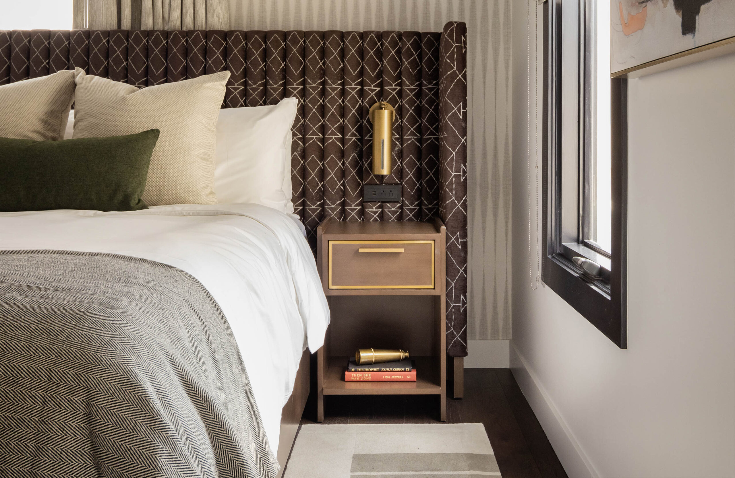 Bedside table in The Study hotel room at Orli La Jolla boutique hotel