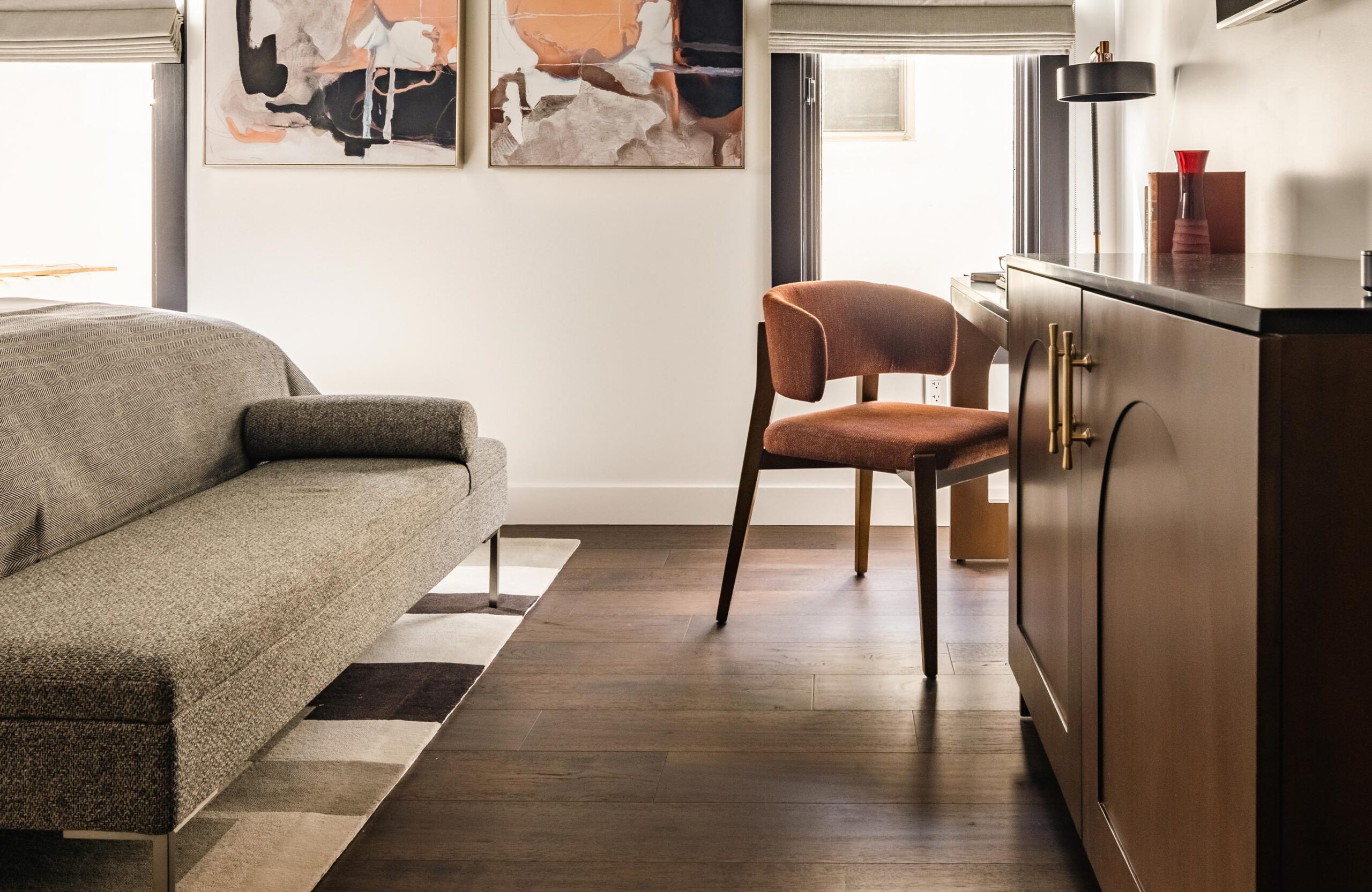 Couch and chair in The Study hotel room at Orli La Jolla boutique hotel