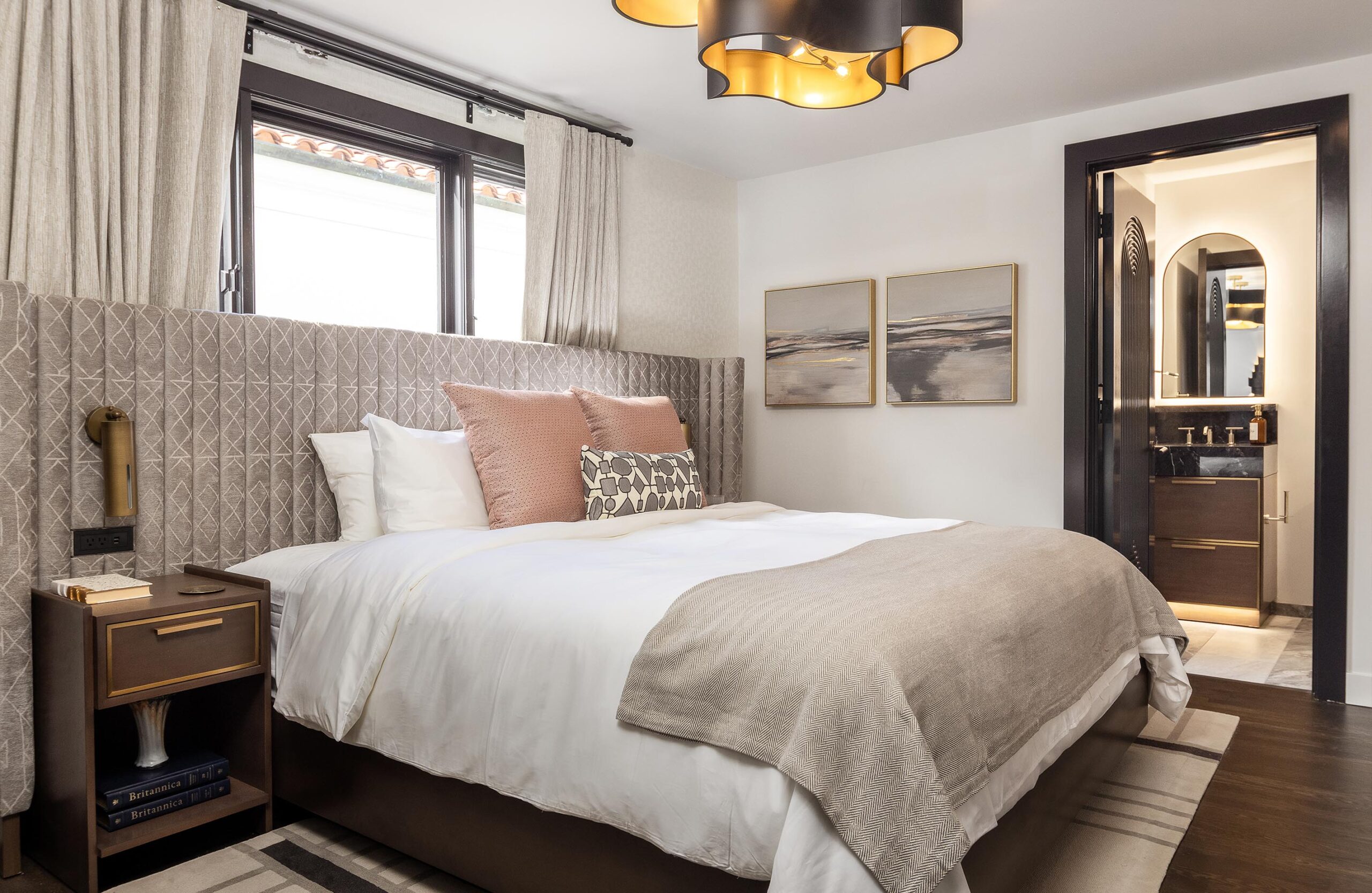 Bed inside of The Sunset Suite at Orli La Jolla boutique hotel