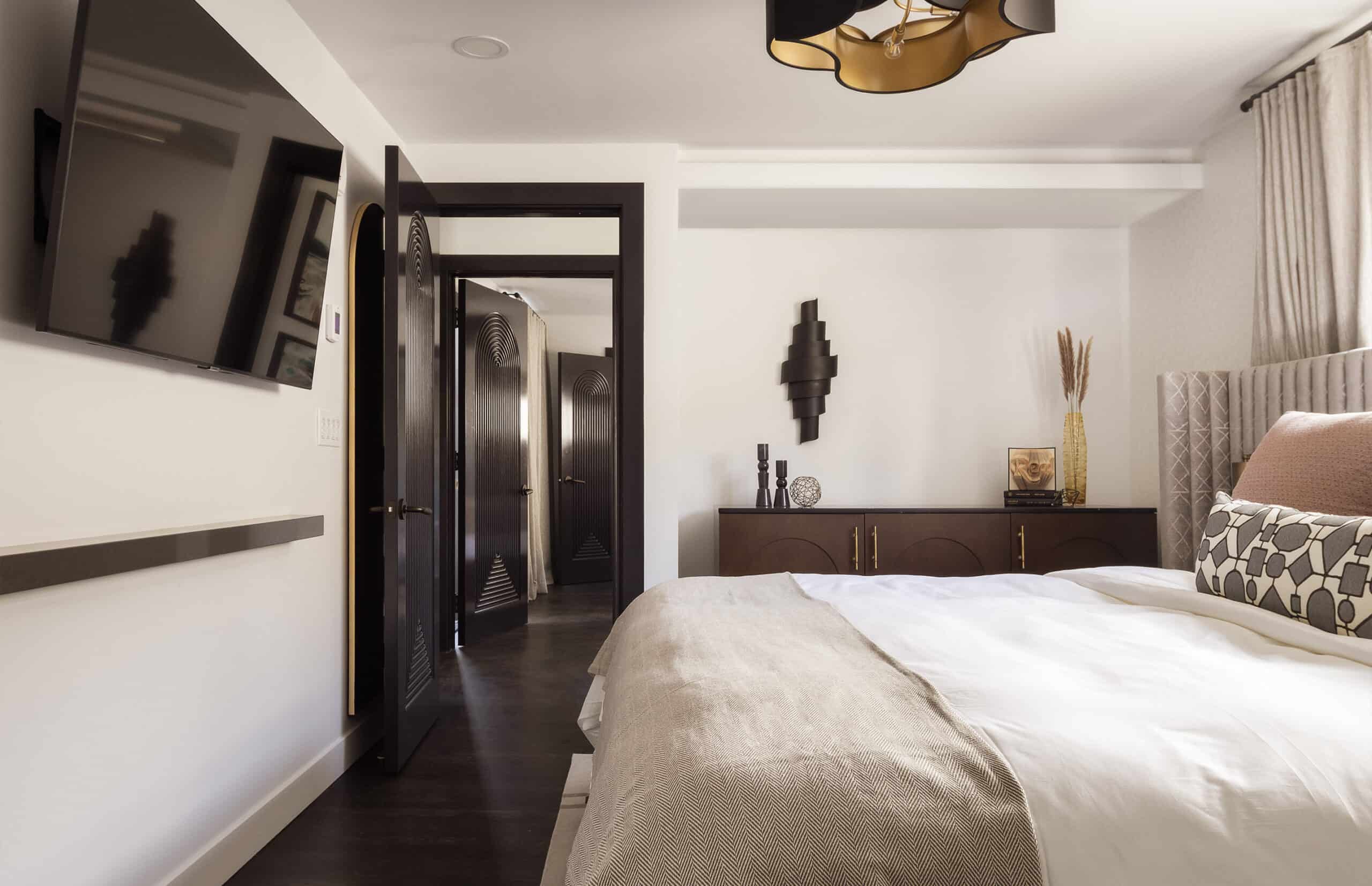 Bed inside of The Sunset Suite at Orli La Jolla boutique hotel