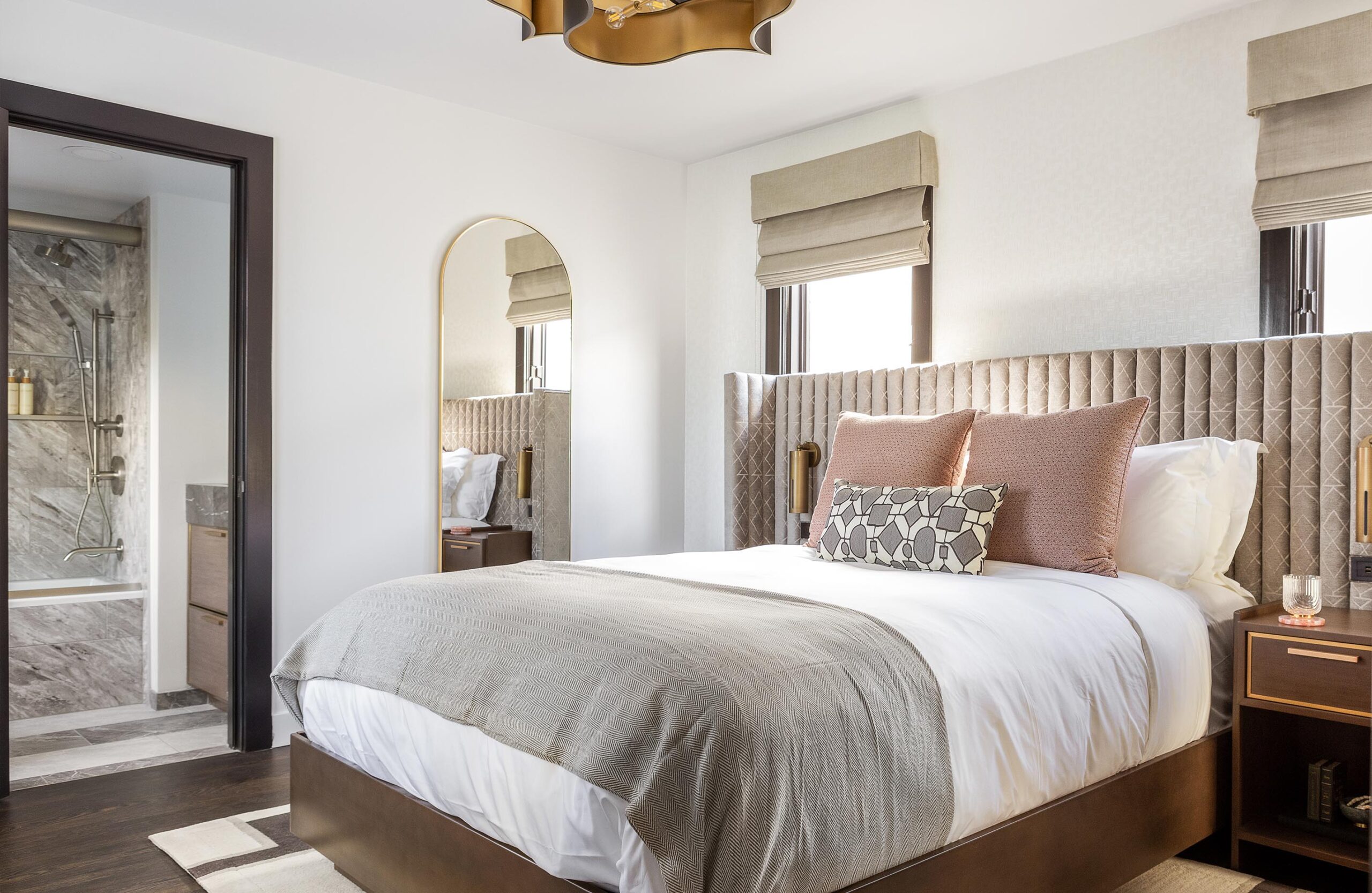 Bed inside of The Sunset Suite at Orli La Jolla boutique hotel