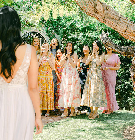 group of bridesmaids seeing the bride for the first time